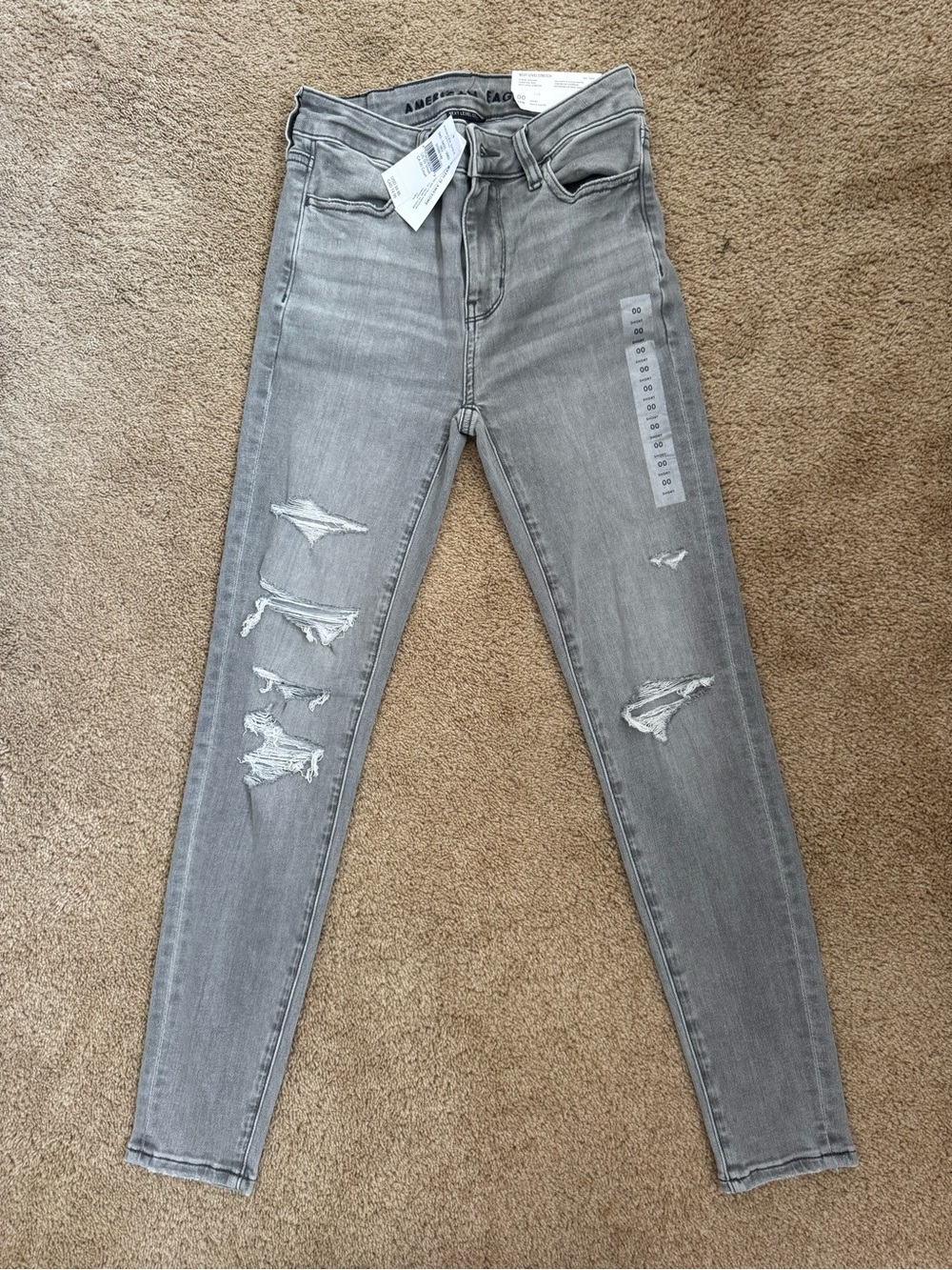 American Eagle Outfitters Light Gray Distressed High-Rise Skinny Jeans
